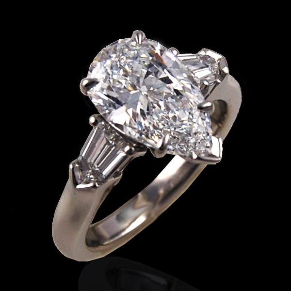 Pear Shape Diamond Three Stone Ring