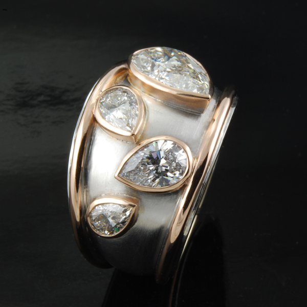 Pear Shaped Diamonds 18K Gold and 18K White Gold Ring